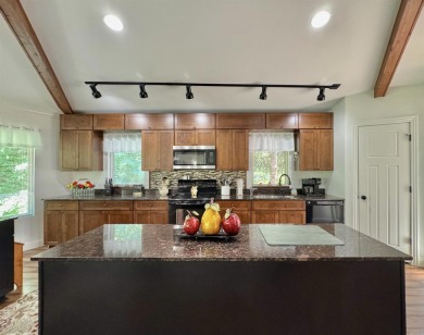 This beautifully updated and meticulously maintained golf course on Magellan Golf Course in Arkansas - for sale on GolfHomes.com, golf home, golf lot