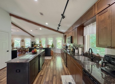 This beautifully updated and meticulously maintained golf course on Magellan Golf Course in Arkansas - for sale on GolfHomes.com, golf home, golf lot