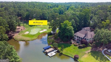 This lakefront spacious single family home in Reynolds Lake on Reynolds Lake Oconee - The Preserve in Georgia - for sale on GolfHomes.com, golf home, golf lot