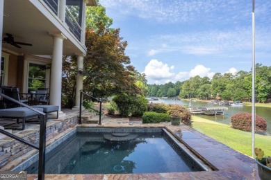 This lakefront spacious single family home in Reynolds Lake on Reynolds Lake Oconee - The Preserve in Georgia - for sale on GolfHomes.com, golf home, golf lot