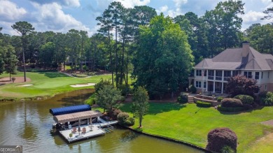 This lakefront spacious single family home in Reynolds Lake on Reynolds Lake Oconee - The Preserve in Georgia - for sale on GolfHomes.com, golf home, golf lot