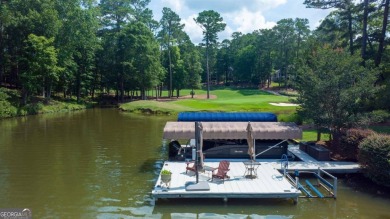 This lakefront spacious single family home in Reynolds Lake on Reynolds Lake Oconee - The Preserve in Georgia - for sale on GolfHomes.com, golf home, golf lot