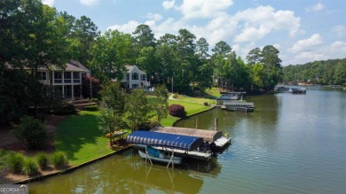 This lakefront spacious single family home in Reynolds Lake on Reynolds Lake Oconee - The Preserve in Georgia - for sale on GolfHomes.com, golf home, golf lot