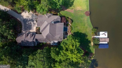 This lakefront spacious single family home in Reynolds Lake on Reynolds Lake Oconee - The Preserve in Georgia - for sale on GolfHomes.com, golf home, golf lot