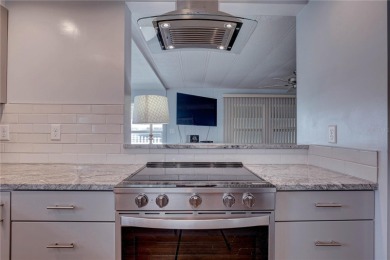 Your Resort-Style Oasis Awaits at 113 Royal Palms Circle, Largo on Palm Hill Golf Club in Florida - for sale on GolfHomes.com, golf home, golf lot