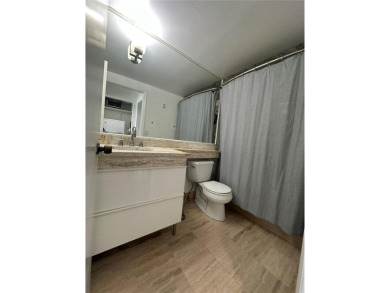 This David Willam furnished studio is located in the heart of on Granada Golf Club in Florida - for sale on GolfHomes.com, golf home, golf lot