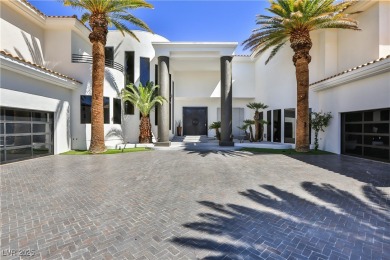 WELCOME TO THIS NEARLY 12,000sqft CUSTOM HOME WITHIN THE GUARD on Spanish Trail Golf and Country Club in Nevada - for sale on GolfHomes.com, golf home, golf lot