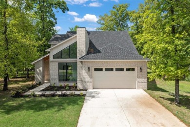 Golf course home overlooking the #15 tee box in prestigious on Pinnacle Golf and Boat Club in Texas - for sale on GolfHomes.com, golf home, golf lot