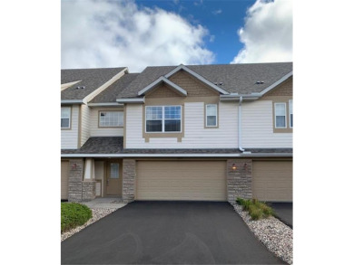 Multi-level walkout townhome w/ mature pine tree privacy. Three on Deer Run Golf Club in Minnesota - for sale on GolfHomes.com, golf home, golf lot