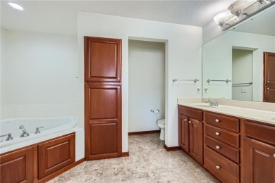 Multi-level walkout townhome w/ mature pine tree privacy. Three on Deer Run Golf Club in Minnesota - for sale on GolfHomes.com, golf home, golf lot