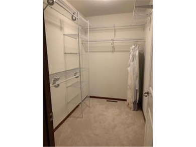 Multi-level walkout townhome w/ mature pine tree privacy. Three on Deer Run Golf Club in Minnesota - for sale on GolfHomes.com, golf home, golf lot