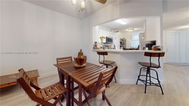 Immaculate 1st-floor unit in HOPA verified 55+ community. This on Sunrise Lakes Phase IV Golf Course in Florida - for sale on GolfHomes.com, golf home, golf lot