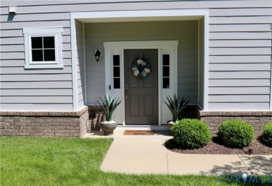 This stunning end-unit townhome in the Magnolia Green community on The Westham Golf Club At Magnolia Green in Virginia - for sale on GolfHomes.com, golf home, golf lot