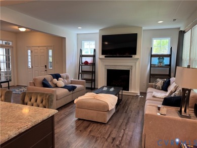 This stunning end-unit townhome in the Magnolia Green community on The Westham Golf Club At Magnolia Green in Virginia - for sale on GolfHomes.com, golf home, golf lot