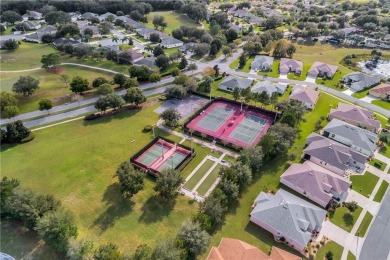 Affordable Low-Maintenance Stucco home in Gated Active-Adult on Arlington Ridge Golf Club in Florida - for sale on GolfHomes.com, golf home, golf lot