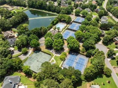 Nestled within the prestigious Polo Golf & Country Club on Polo Golf and Country Club in Georgia - for sale on GolfHomes.com, golf home, golf lot