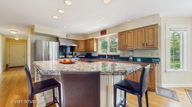 Serenity and beauty will greet you as you enter this stunning on Bull Valley Golf Club in Illinois - for sale on GolfHomes.com, golf home, golf lot