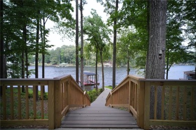 Dive into lakeside luxury at its finest in the heart of Turtle on Turtle Cove Golf Course in Georgia - for sale on GolfHomes.com, golf home, golf lot