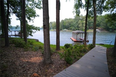 Dive into lakeside luxury at its finest in the heart of Turtle on Turtle Cove Golf Course in Georgia - for sale on GolfHomes.com, golf home, golf lot