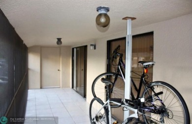 Great second floor 2 bedroom, 2 bath condo with large patio on Deer Creek Golf Club in Florida - for sale on GolfHomes.com, golf home, golf lot