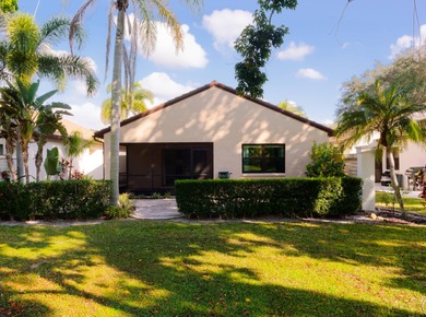 Welcome to this inviting single-story residence in the highly on PGA National Golf Club in Florida - for sale on GolfHomes.com, golf home, golf lot