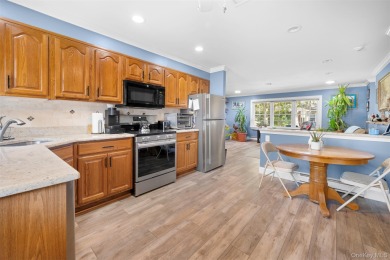 Move right into this beautiful 2-bedroom, 1-bathroom end-unit on Leisure Village Golf Course in New York - for sale on GolfHomes.com, golf home, golf lot