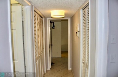 Great second floor 2 bedroom, 2 bath condo with large patio on Deer Creek Golf Club in Florida - for sale on GolfHomes.com, golf home, golf lot