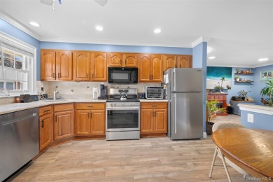 Move right into this beautiful 2-bedroom, 1-bathroom end-unit on Leisure Village Golf Course in New York - for sale on GolfHomes.com, golf home, golf lot