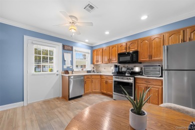 Move right into this beautiful 2-bedroom, 1-bathroom end-unit on Leisure Village Golf Course in New York - for sale on GolfHomes.com, golf home, golf lot