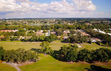 Welcome to this inviting single-story residence in the highly on PGA National Golf Club in Florida - for sale on GolfHomes.com, golf home, golf lot