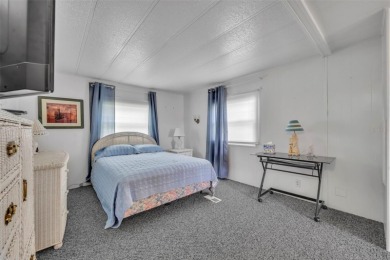Welcome to the 55+ Molokai Co-Op Mobile Home Park! This turnkey on Lakes at Leesburg Golf Course in Florida - for sale on GolfHomes.com, golf home, golf lot