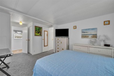 Welcome to the 55+ Molokai Co-Op Mobile Home Park! This turnkey on Lakes at Leesburg Golf Course in Florida - for sale on GolfHomes.com, golf home, golf lot