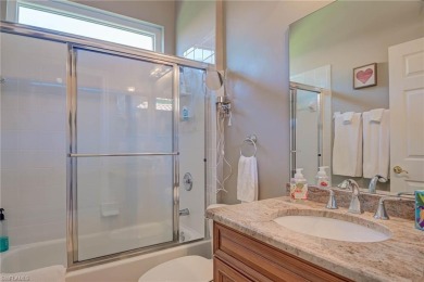 Experience luxury living in this stunning, executive golf course on Gateway Golf and Country Club in Florida - for sale on GolfHomes.com, golf home, golf lot