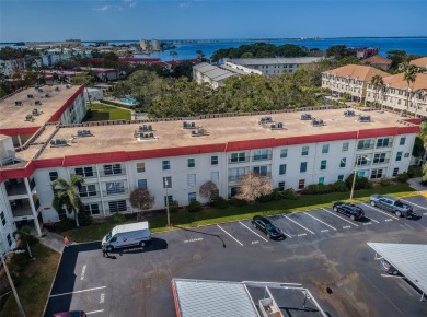 This 2-bedroom, 1.5-bath condo comes fully furnished and on The Dunedin Country Club in Florida - for sale on GolfHomes.com, golf home, golf lot