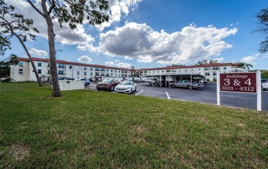 This 2-bedroom, 1.5-bath condo comes fully furnished and on The Dunedin Country Club in Florida - for sale on GolfHomes.com, golf home, golf lot