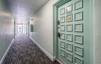 This 2-bedroom, 1.5-bath condo comes fully furnished and on The Dunedin Country Club in Florida - for sale on GolfHomes.com, golf home, golf lot