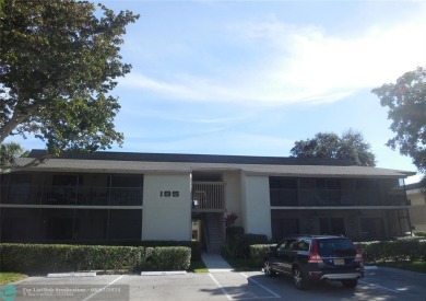 Great second floor 2 bedroom, 2 bath condo with large patio on Deer Creek Golf Club in Florida - for sale on GolfHomes.com, golf home, golf lot