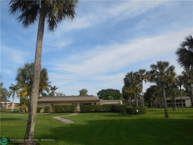 Great second floor 2 bedroom, 2 bath condo with large patio on Deer Creek Golf Club in Florida - for sale on GolfHomes.com, golf home, golf lot