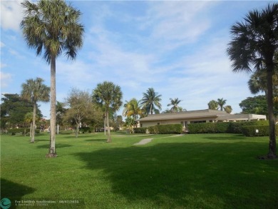 Great second floor 2 bedroom, 2 bath condo with large patio on Deer Creek Golf Club in Florida - for sale on GolfHomes.com, golf home, golf lot