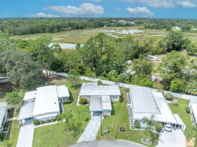 Welcome to the 55+ Molokai Co-Op Mobile Home Park! This turnkey on Lakes at Leesburg Golf Course in Florida - for sale on GolfHomes.com, golf home, golf lot