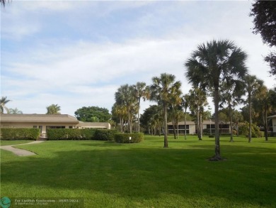 Great second floor 2 bedroom, 2 bath condo with large patio on Deer Creek Golf Club in Florida - for sale on GolfHomes.com, golf home, golf lot