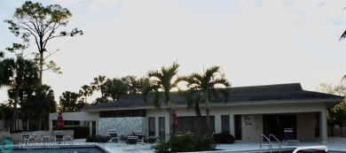 Great second floor 2 bedroom, 2 bath condo with large patio on Deer Creek Golf Club in Florida - for sale on GolfHomes.com, golf home, golf lot