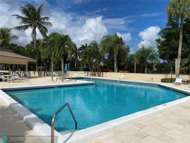 Great second floor 2 bedroom, 2 bath condo with large patio on Deer Creek Golf Club in Florida - for sale on GolfHomes.com, golf home, golf lot