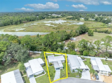 Welcome to the 55+ Molokai Co-Op Mobile Home Park! This turnkey on Lakes at Leesburg Golf Course in Florida - for sale on GolfHomes.com, golf home, golf lot