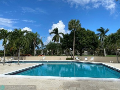 Great second floor 2 bedroom, 2 bath condo with large patio on Deer Creek Golf Club in Florida - for sale on GolfHomes.com, golf home, golf lot