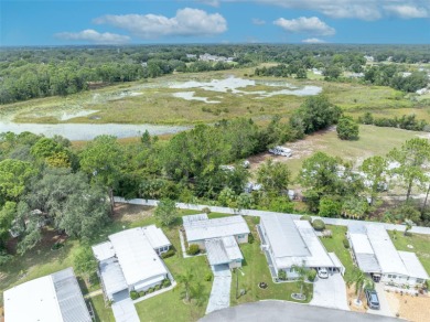 Welcome to the 55+ Molokai Co-Op Mobile Home Park! This turnkey on Lakes at Leesburg Golf Course in Florida - for sale on GolfHomes.com, golf home, golf lot