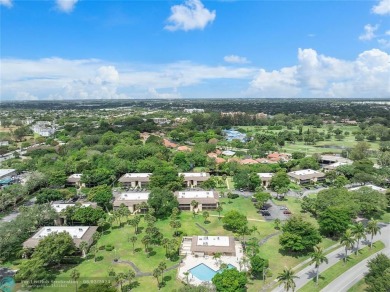 Great second floor 2 bedroom, 2 bath condo with large patio on Deer Creek Golf Club in Florida - for sale on GolfHomes.com, golf home, golf lot