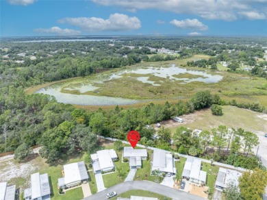 Welcome to the 55+ Molokai Co-Op Mobile Home Park! This turnkey on Lakes at Leesburg Golf Course in Florida - for sale on GolfHomes.com, golf home, golf lot