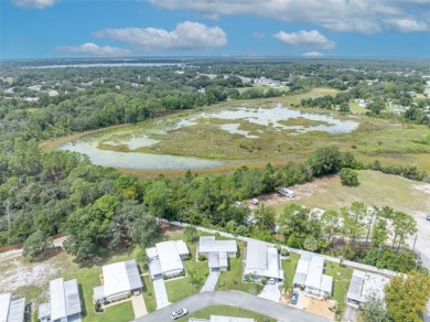 Welcome to the 55+ Molokai Co-Op Mobile Home Park! This turnkey on Lakes at Leesburg Golf Course in Florida - for sale on GolfHomes.com, golf home, golf lot