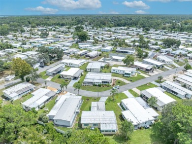 Welcome to the 55+ Molokai Co-Op Mobile Home Park! This turnkey on Lakes at Leesburg Golf Course in Florida - for sale on GolfHomes.com, golf home, golf lot